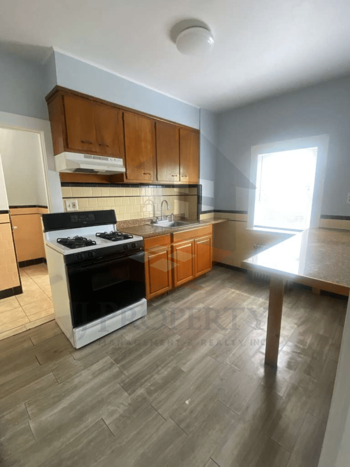 LOGO+PROPERTY PIC HORIZONTAL (63) 2-Bedroom Apartment w/ Utilities Included โ 3rd Floor