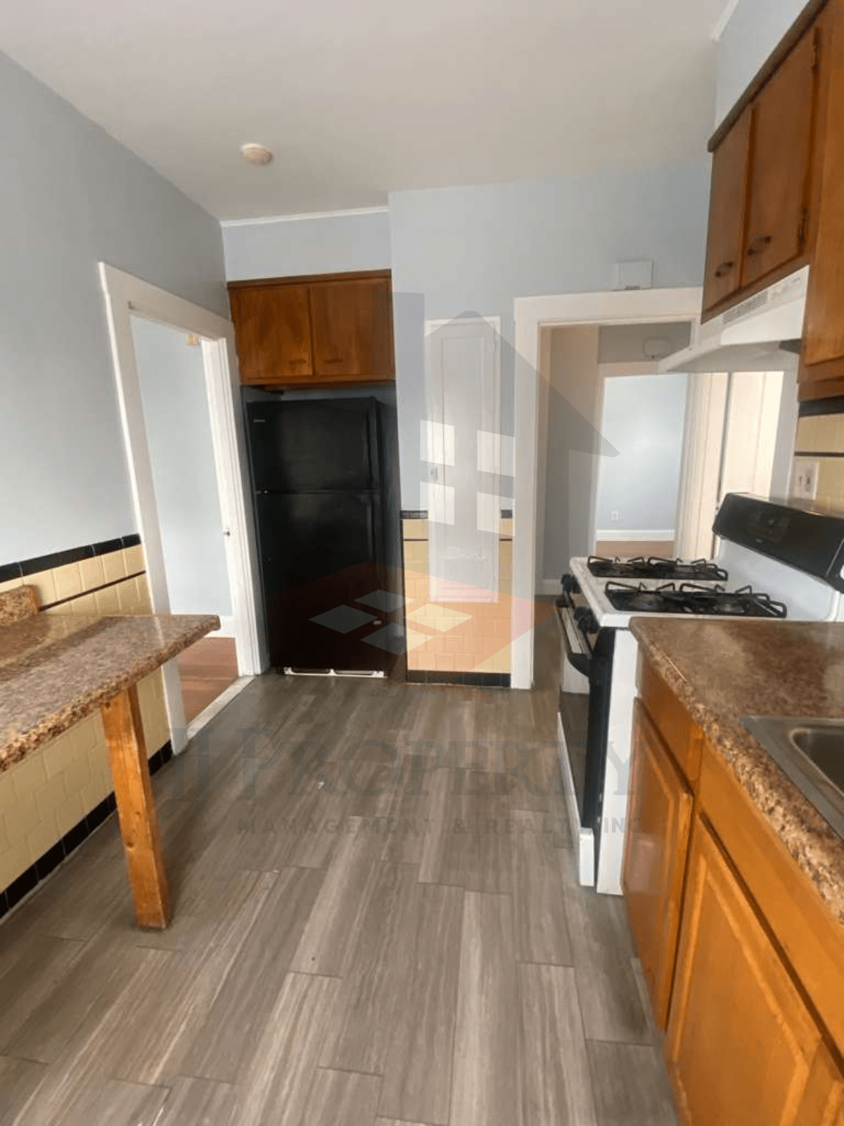 LOGO+PROPERTY PIC HORIZONTAL (65) 2-Bedroom Apartment w/ Utilities Included โ 3rd Floor